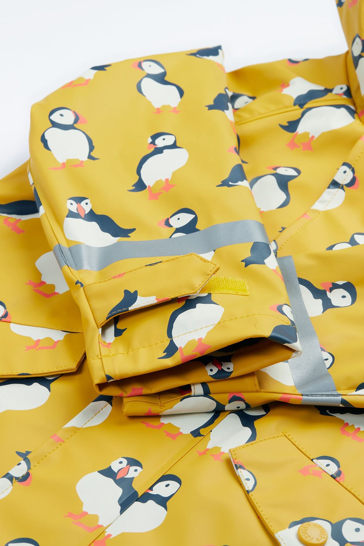 Frugi Puddle Buster Raincoat Yellow Puffins Clothing 2-3YRS / Yellow,3-4YRS / Yellow,4-5YRS / Yellow,5-6YRS / Yellow,6-7YRS / Yellow,7-8YRS / Yellow,1-2 YRS / Yellow