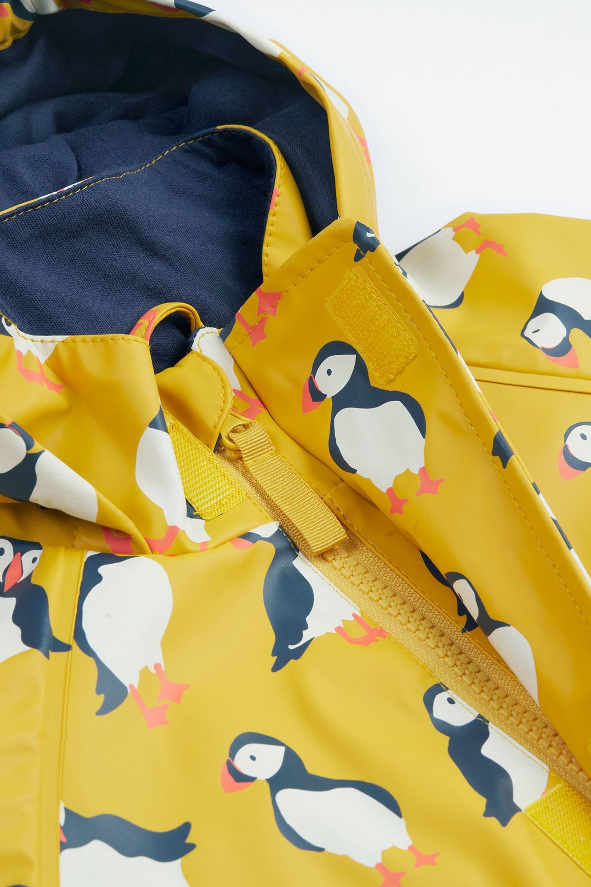 Frugi Puddle Buster Raincoat Yellow Puffins Clothing 2-3YRS / Yellow,3-4YRS / Yellow,4-5YRS / Yellow,5-6YRS / Yellow,6-7YRS / Yellow,7-8YRS / Yellow,1-2 YRS / Yellow
