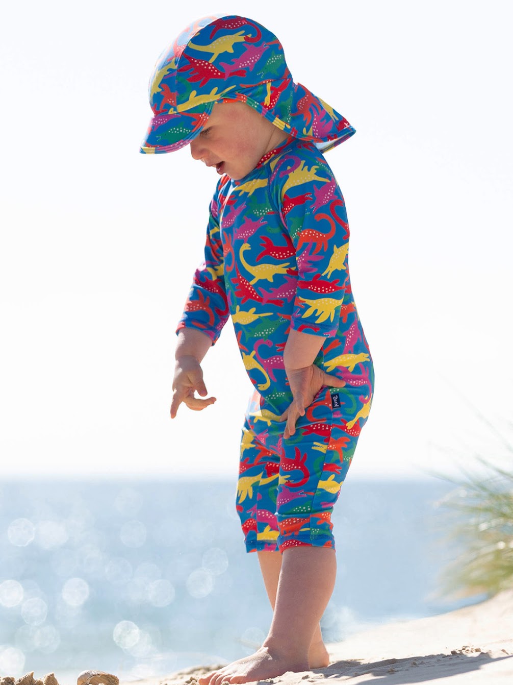 Kite Sea Dino Sun Suit 9699 Clothing 3-6M / Multi,6-9M / Multi,9-12M / Multi,12-18M / Multi,18-24M/2Y / Multi,3YRS / Multi,4YRS / Multi,5YRS / Multi