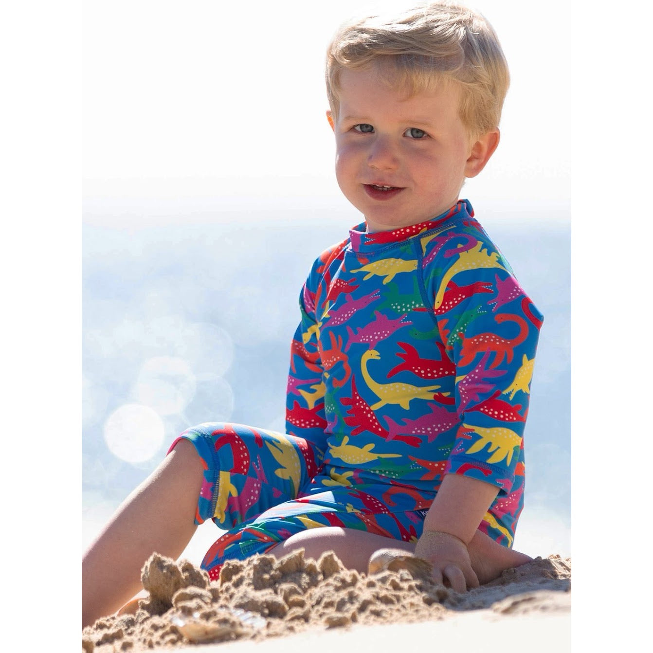 Kite Sea Dino Sun Suit 9699 Clothing 3-6M / Multi,6-9M / Multi,9-12M / Multi,12-18M / Multi,18-24M/2Y / Multi,3YRS / Multi,4YRS / Multi,5YRS / Multi